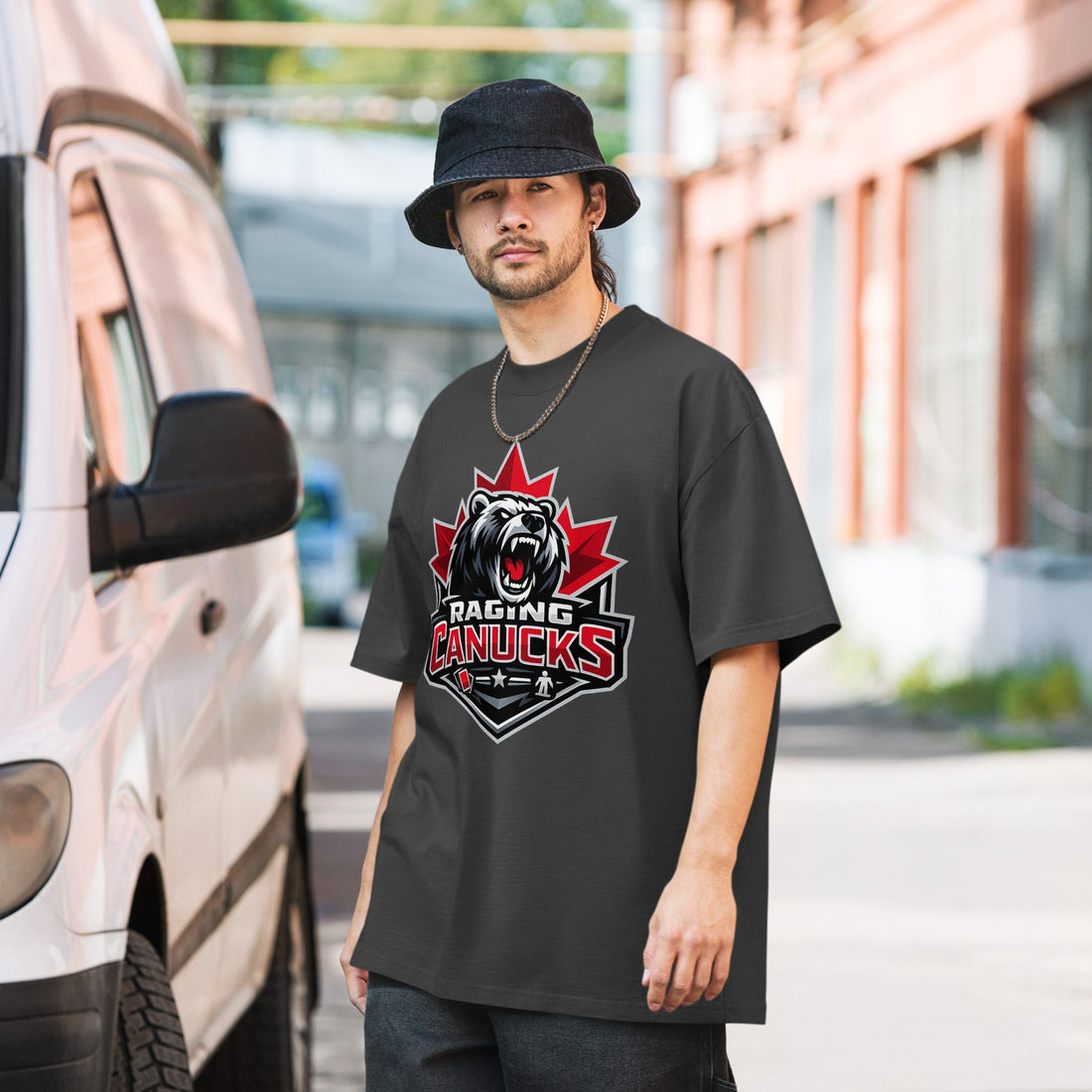Raging Canucks Oversized Faded Tee in faded black with bear and maple leaf crest