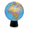 A high-resolution hero shot of the detailed Replogle rotating desk globe on its black conical base against a pure white background.