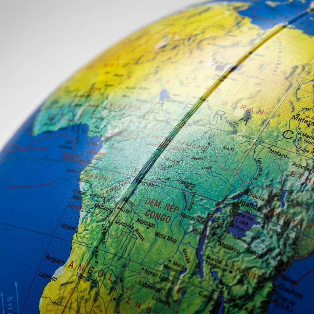 Extreme close-up of the inflatable Replogle Globe's surface, showing clear cartographic print and welded seam texture.