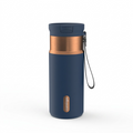 Contigo 16oz Snapseal PVD Travel Mug in Abyss Blue with copper accents, Snapseal lid, and black carry loop.