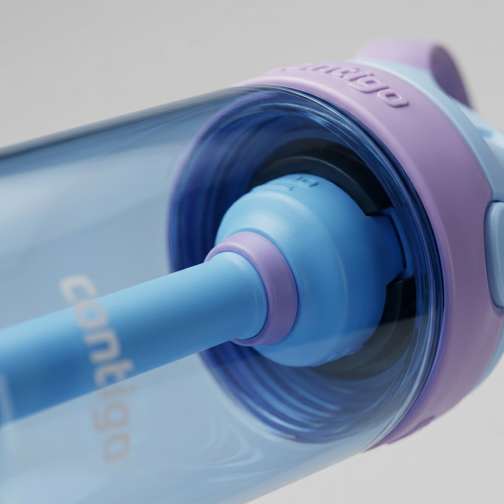 Macro detail of the Contigo Autospout water bottle interior showing the spill-proof straw valve.