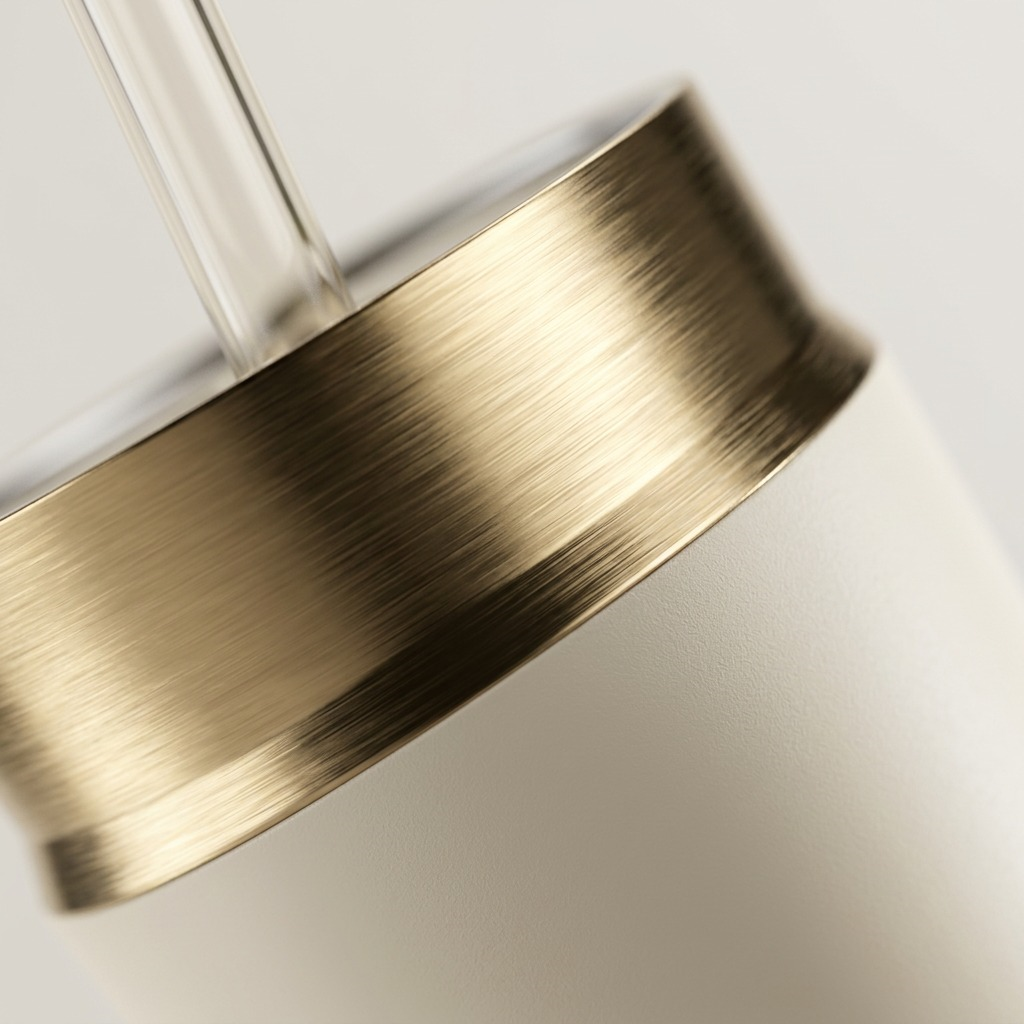 Macro view of the brushed gold PVD lid and smooth oatmilk finish on a Contigo Snapseal travel mug.
